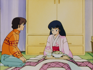 Godai gives Kyōko a bowl of ramen he cooked