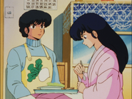 Kyōko eats food prepared by Mitaka