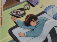 Godai still sleeping in his futon