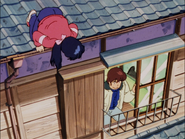 Kyōko talks to Godai while fixing the ceiling