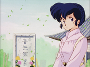 Kyōko at the grave of her husband