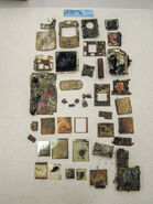 Trial exhibit 404 - overview of charred electronics pieces