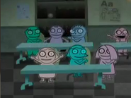 The pink schoolgirl sitting next to Maggie