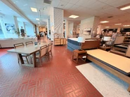 Upper-level furniture section, next to the other second-level mall entrance.