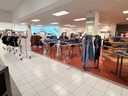 Lower-level more men's denim and T-Shirts department.