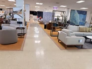 Upper-level sofas and furniture section.