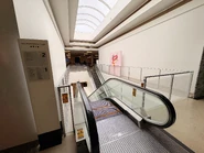 Upper-level escalators, connecting the First-Level and Second-Level.