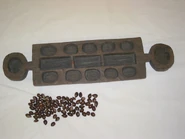 NWNeuguineaBrettspiel.jpg (44 KB) Tabuleiro de Mancala de Arguni, Nova Guiné