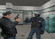 A CCPD officer (left) and a member of S.W.A.T. (right)