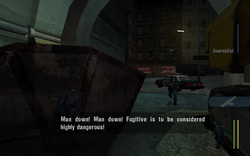 The player lures the other cop to look behind and sees the first cop's corpse laying.