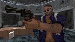 Lionel Starkweather holding a Revolver Six Shooter.