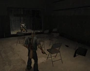 Final Game. Note the different seating, along with destroyable glass and the beta Cash corpse sitting on the chair.