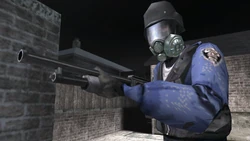 A SWAT officer armed with a Shotgun.