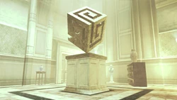 Sculpture of The Project's symbol.