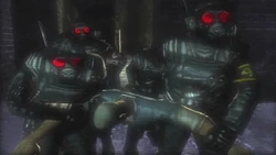 The Cerberus dragging Cash to the back of their Armored Truck.