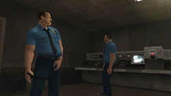 Two Security Guards inside the guard hut.