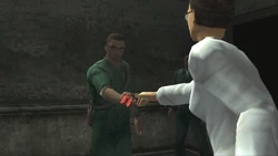 Judy giving the safe house keys to Daniel. Note the nightclub's "red butterfly" on the keychain.