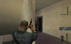 The player goes upstairs and kills two cops wielding Shotguns with the Six Shooter.