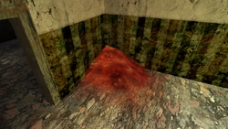 The room as seen in Road to Ruin, with a pile of meat without the corpse's model layered on top of it.