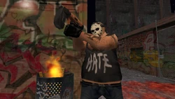 A Skinz member guarding the electric gate with a Nail Gun.