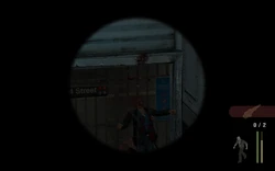 The player shoots a cop with the sniper rifle from the roof.