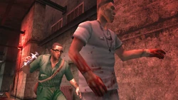 Daniel Lamb about to execute an Asylum Staff member.