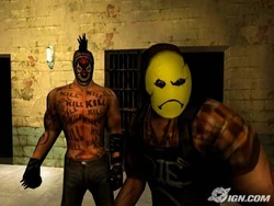 A Big and a Medium Smiley looking at the camera, on the bottom cell blocks.