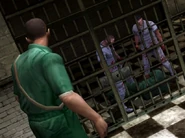 Orderlies beating an inmate.