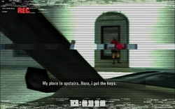 The Journalist unlocking the door to the inside apartment.