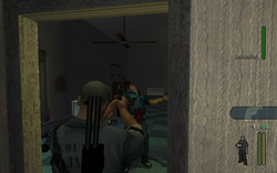 The player kills three cops near the kitchen.