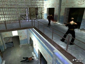 Cash shooting the Smileys, with a dead one downstairs.