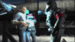 Cerberus Leader incapacitating Cash with a Taser.