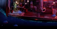 Piranhas swimming around the underground submarine.
