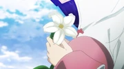Rina crying in the flower garden.