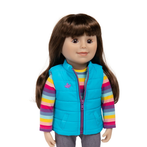 Maplelea&ME! doll KMF46 with long dark brown hair with bangs, brown eyes, and light skin, wearing Maplelea&ME! starter outfit—multicoloured striped long-sleeved T-shirt, blue jeggings, sky blue quilted vest with purple embroidered maple leaf and purple zipper, and dark purple slip-on shoes.