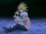 Tom clinging to Ginta.