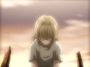 Rolan mourning his parents' deaths.