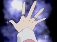 The second unused ring on her ring finger.