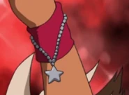 Star bracelet on Chaton's left wrist.