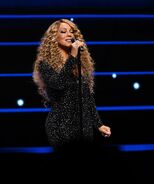 Carey performing "Vision of Love."