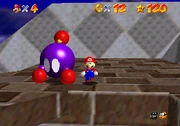 Mario standing next to a Chuckya in Super Mario 64