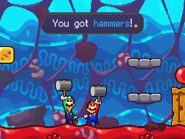 Mario and Luigi getting their hammers in the Trash Pit from Mario & Luigi: Bowser's Inside Story and Mario & Luigi: Bowser's Inside Story + Bowser Jr.'s Journey