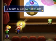 The Yellow Yoshi in Yoshi Theater as seen in the remake.