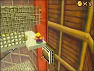 Wario in the Cage.png (237 KB) Wario entering a cage with a Power Star in Super Mario 64 DS.