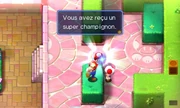 Mario obtenant un super champignon dans Mario & Luigi: Superstar Saga + Les sbires de Bowser