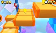 Mario jumps at some Donut Lifts.