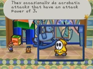 Goombario Tattles a yellow Shy Guy.