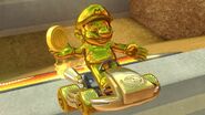 In-game screen shot of Gold Mario with the Golden Kart and Wheels