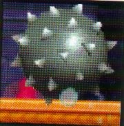 A Giant Spiked Ball in New Super Mario Bros.