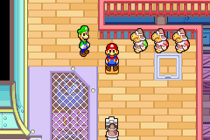 Mario se faisant prendre en photo afin de compléter son passeport.